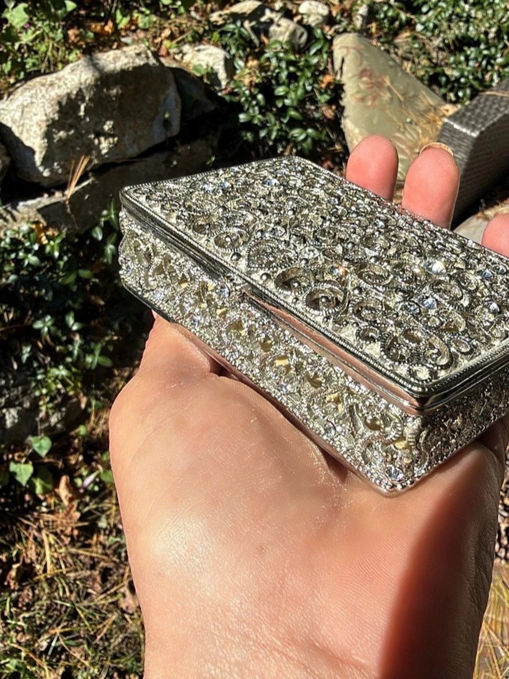 Ornate filigree silver and rhinestone trinket box